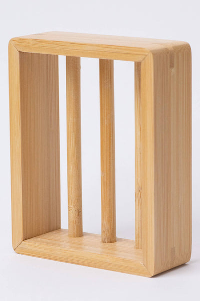 
                    
                      Moso Bamboo Soap Shelf, natural light bamboo wood with rounded corners, angled view highlighting three vertical support rods.
                    
                  