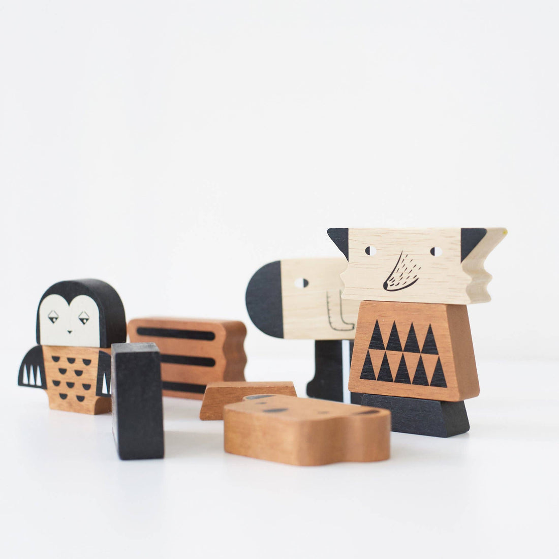 Wee Gallery Animal Stacking Tower, natural rubberwood blocks with black animal patterns, assembled and unassembled pieces,…