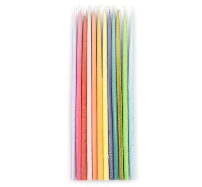 
                    
                      Thin Rainbow Taper Candles, 12 pastel stearin wax candles standing vertically in a rainbow color gradient.
                    
                  