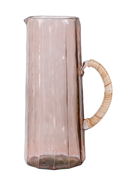 
                    
                      Handblown Hammered Glass Pitcher, blush pink textured glass with natural rattan handle detail, full side view.
                    
                  