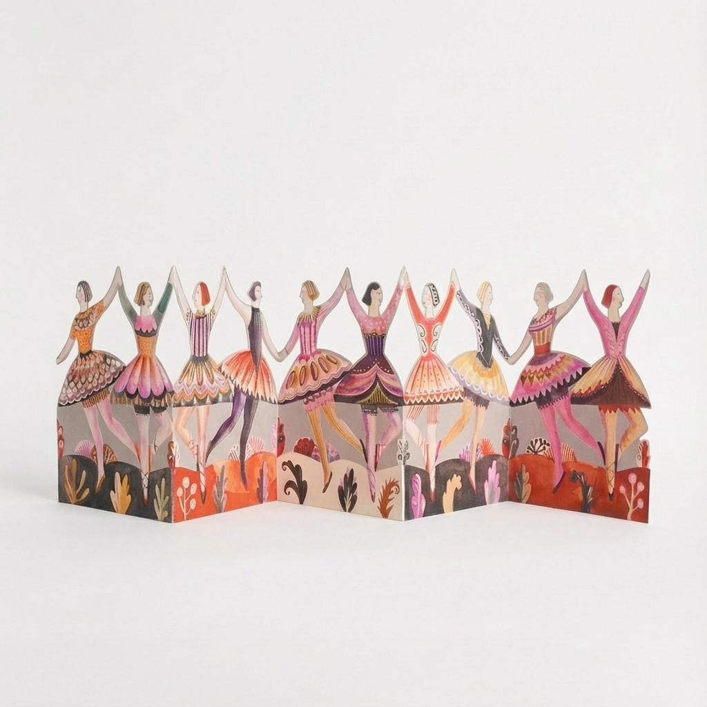 Art Angels Dancers Die-Cut Concertina Card, a line of colorful illustrated ballerinas holding hands, fully extended, front…