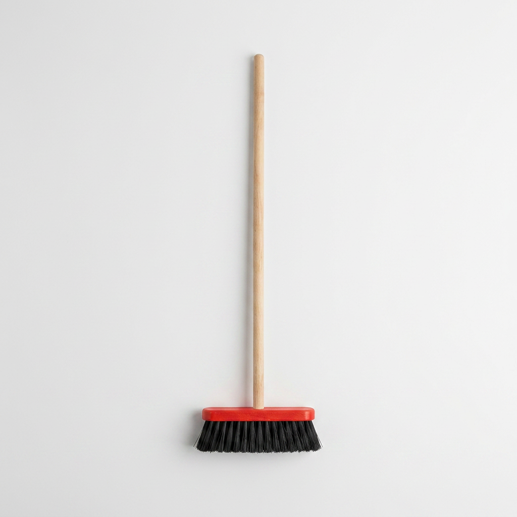 Pretend Play Broom, red head with black bristles and light wood handle, full length vertical view on white.