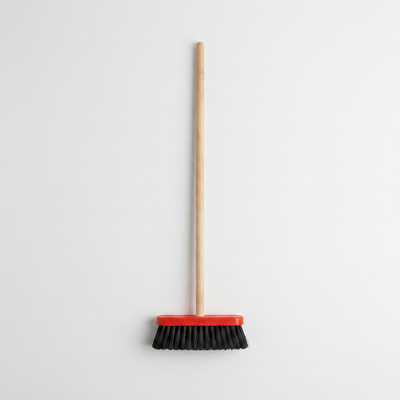 
                    
                      Pretend Play Broom, red head with black bristles and light wood handle, full length vertical view on white.
                    
                  