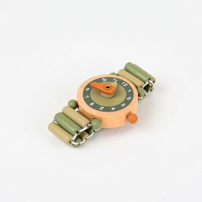 
                    
                      Raph wooden watch, natural wood face with green numbers, green and tan beaded elastic strap construction, angled close-up.
                    
                  