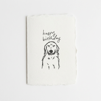 
                    
                      White letterpress card with a black line drawing of a golden retriever and 'happy birthday' text on a white background
                    
                  