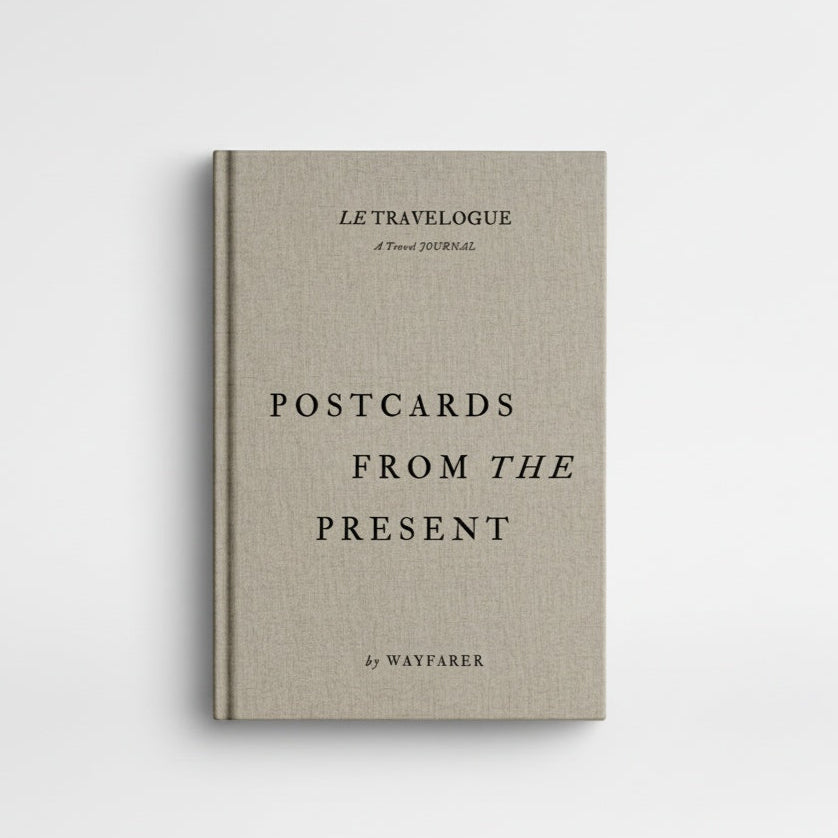 Wayfarer Postcards from the Present travel journal, premium beige linen cover, front on white.