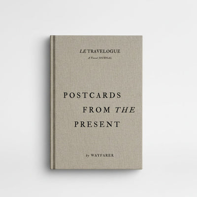 
                    
                      Wayfarer Postcards from the Present travel journal, premium beige linen cover, front on white.
                    
                  