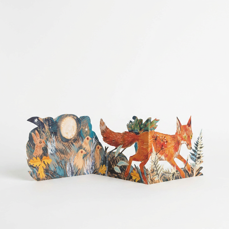 Art Angels Three Fold Fox die-cut card, Mark Hearld illustration, unfolded, showing fox, rabbit, and birds in a moonlit…