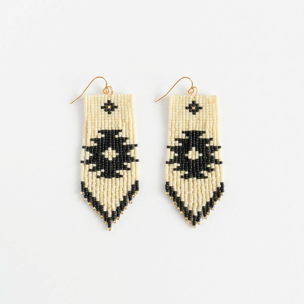 Mayana Designs Beaded Tribal Fringe earrings, handwoven cream & black Miyuki glass beads, gold hooks, flat lay pair on white.