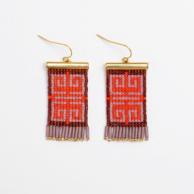
                    
                      Beaded earrings with geometric pattern on a white background
                    
                  