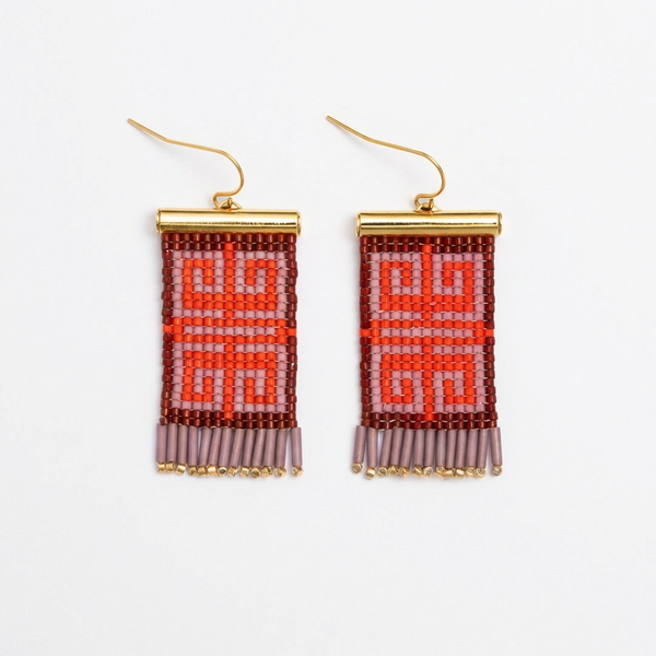 Beaded earrings with geometric pattern on a white background
