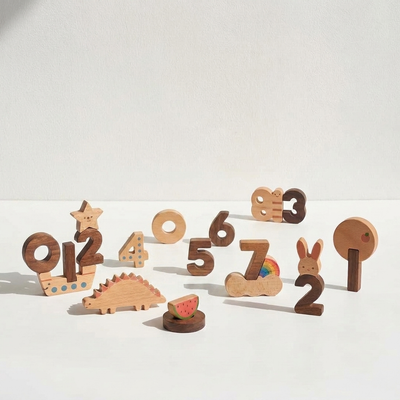 
                    
                      Numbers Play Block Set, solid beech and walnut wood learning toy. Assorted number blocks and animal/nature designs,…
                    
                  