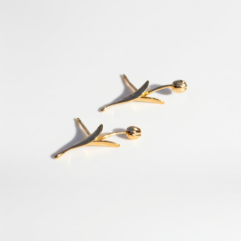 Peter + June Holland Tulip Studs earrings, 18K gold-plated brass, flat lay pair, front on white.