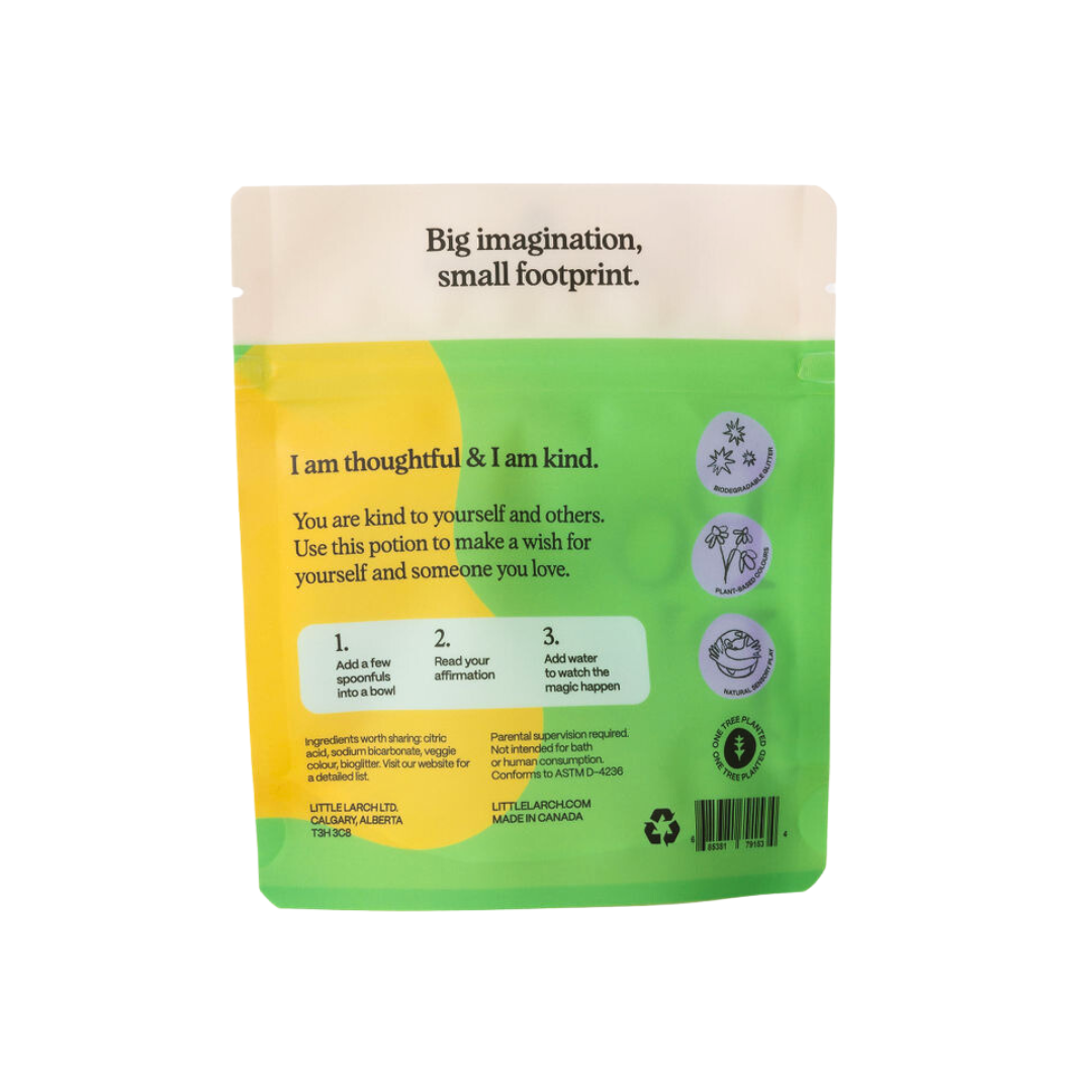 Green and yellow package for Little Larch Potion Play Wish Spell.