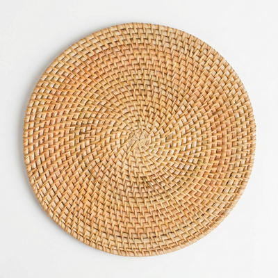 
                    
                      Round woven placemat on a white background
                    
                  