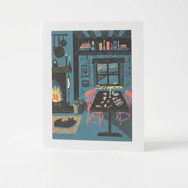 Art Angels Ten Past Ten Card stationery, illustrated by Rupert Shephard: a blue room with fireplace, sleeping black cat, and…