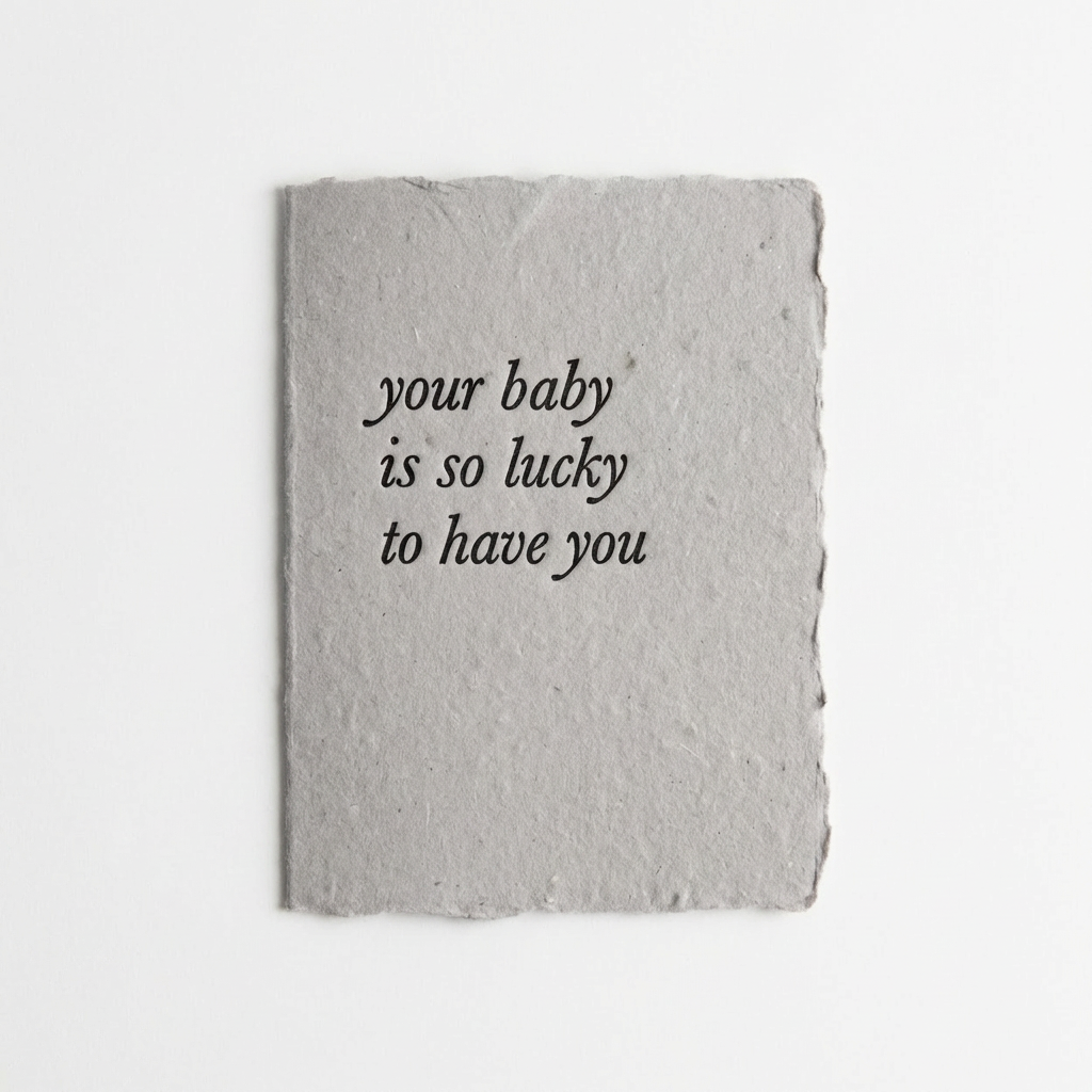 Handmade letterpress card with 'your baby is so lucky to have you' text on a white background