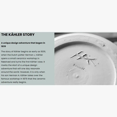 
                    
                      Hammershøi spice grinder, porcelain bottom close-up, revealing the etched Kähler mark and 'DENMARK' text.
                    
                  
