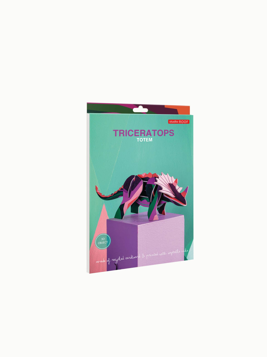 3D Triceratops model kit package, colorful geometric dinosaur illustration, made of recycled cardboard.