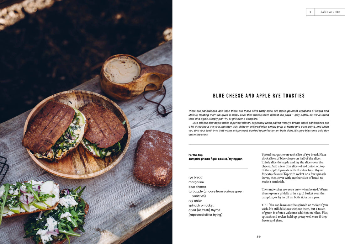 Food Over the Campfire print book, open page with 'Blue Cheese and Apple Rye Toasties' recipe next to photo of grilled…