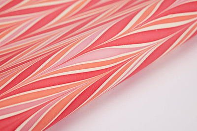 
                    
                      Paper Mirchi Candy Stripes hand marbled wrapping paper, red, pink, orange, and cream wavy stripes on handmade paper,…
                    
                  