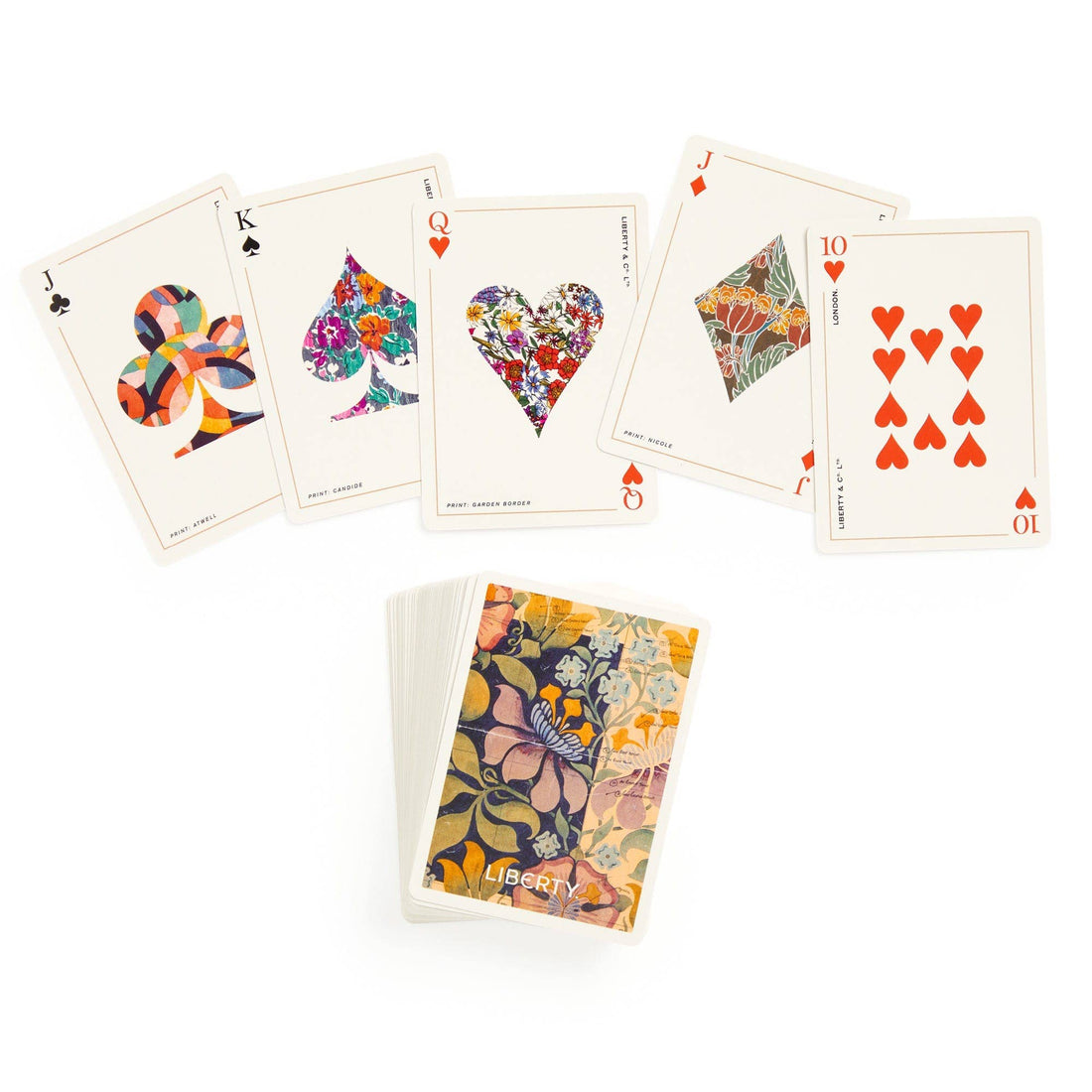 Liberty Archive playing card deck, fanned cards showcasing diverse colorful floral and abstract patterns, with the patterned…