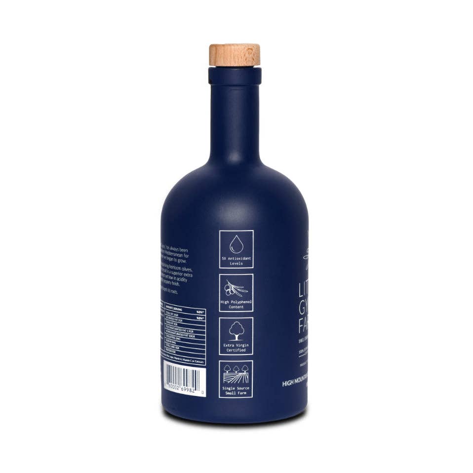 Little Gypsy Farms High Mountain Organic Olive Oil, navy blue bottle with wood cork, 3/4 back view showing antioxidant and…