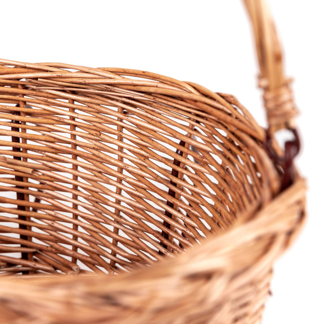 Wicker Bicycle Basket, natural rattan, close-up of intricate side weaving texture.