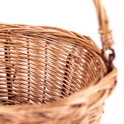 
                    
                      Wicker Bicycle Basket, natural rattan, close-up of intricate side weaving texture.
                    
                  