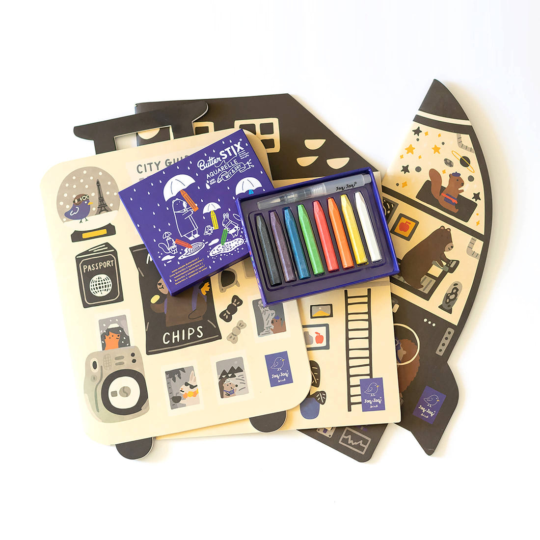 Jumbo Rocket coloring book, paper rocket shape unfolded showing playful illustrations, with a box of colorful Butter Stix…
