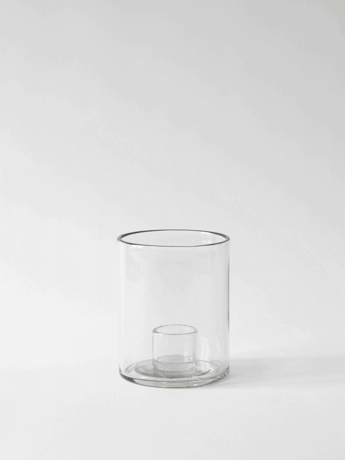 Tell Me More Luna Small candle holder, clear recycled glass, front view on white background.
