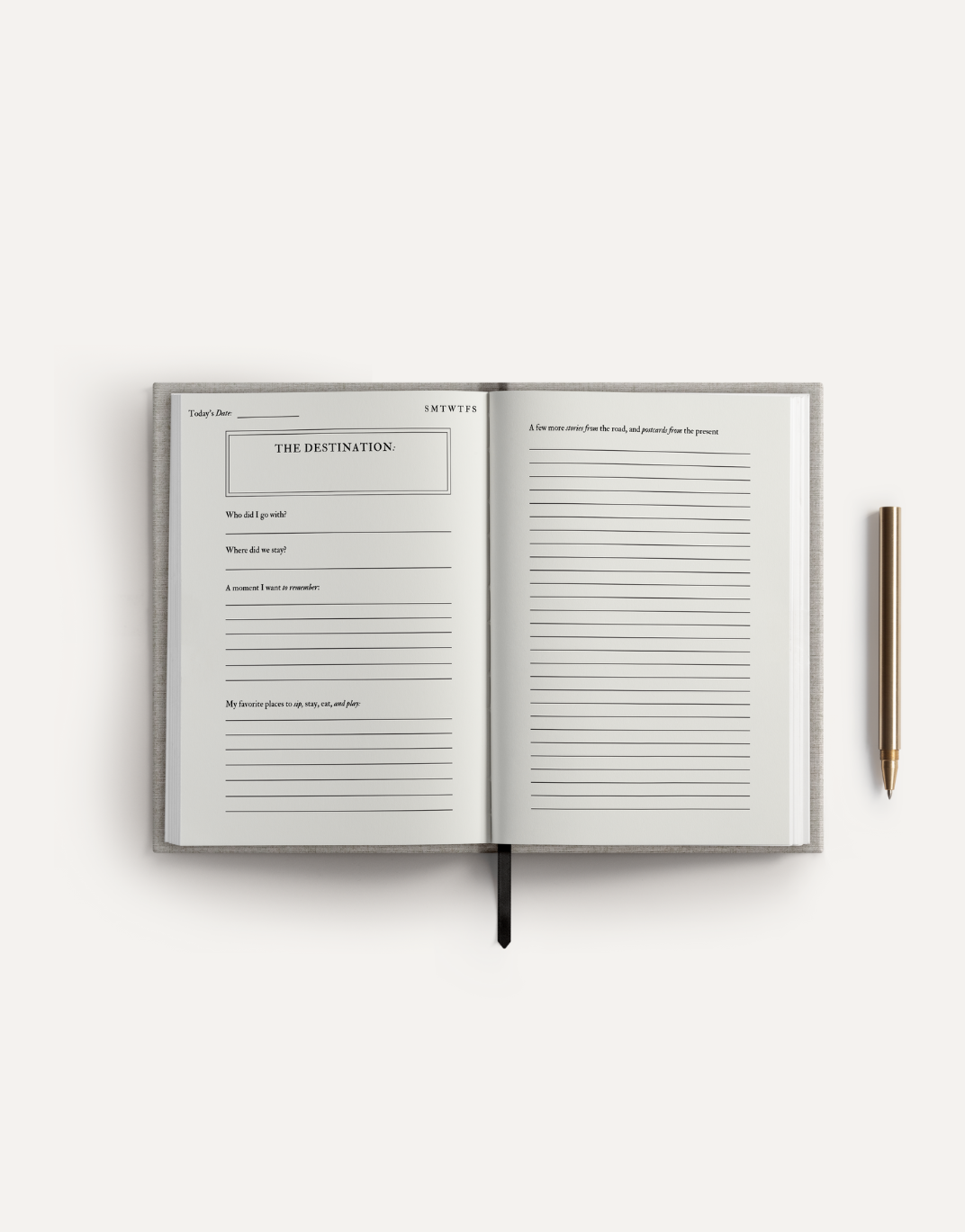Postcards from the Present Travel Journal, open to internal pages showing writing prompts and lined space, light gray linen…