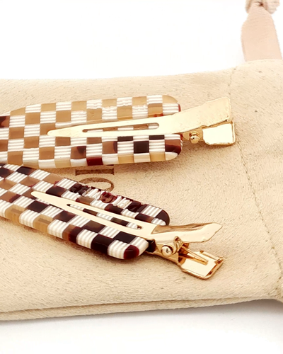 
                    
                      Checkerboard Hair Clips, set of 2, brown, tan, and white plant-based cellulose acetate checkerboard, with gold-tone clips,…
                    
                  