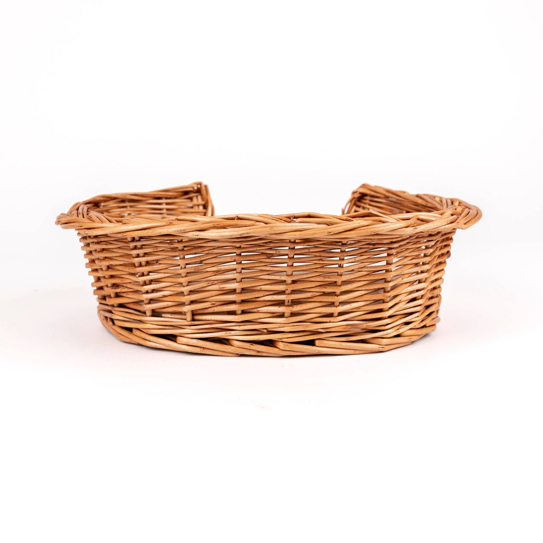 Wicker Dog Basket, natural light brown wicker, showing detailed side weave and front dip.