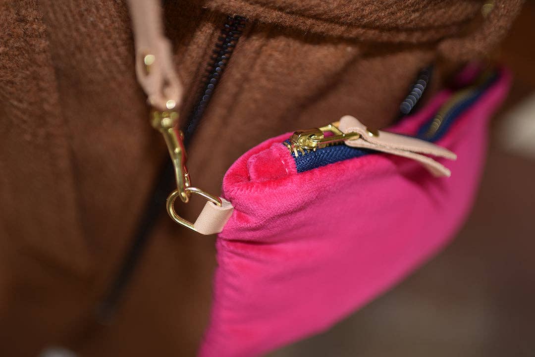 Ellie wristlet, hot pink cotton velvet with navy zipper, natural leather pull and brass clasp detail.