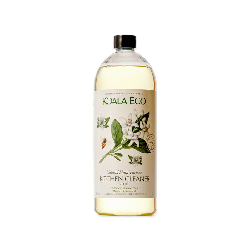 Koala Eco Lemon Myrtle & Mandarin Kitchen Cleaner Refill bottle, clear plastic, light yellow liquid, botanical label, front…