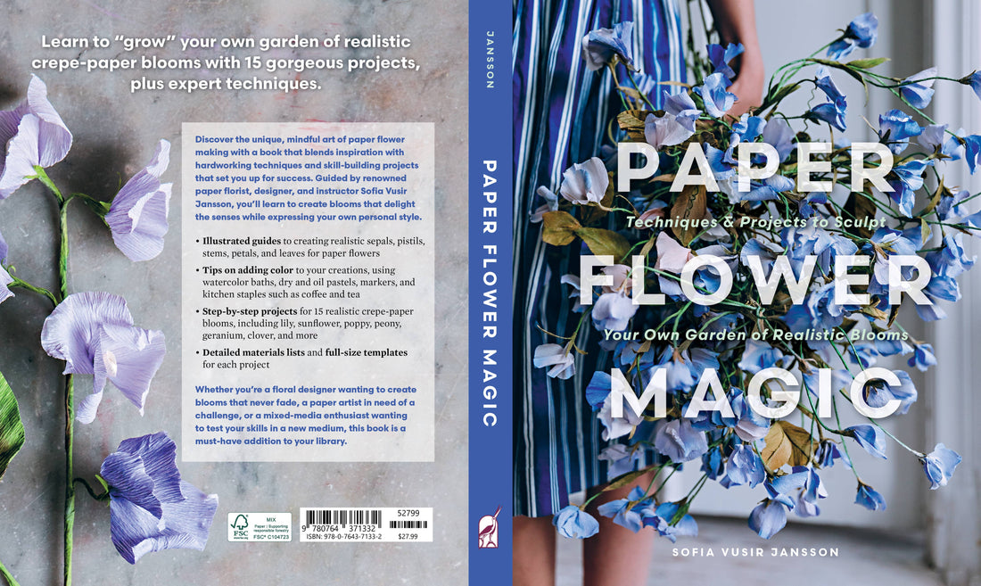 Paper Flower Magic book, full back cover showing project details & ISBN, blue spine, and realistic purple & blue crepe paper…