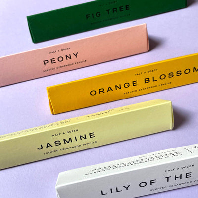 
                    
                      Lavender Scented Pencils. Flat lay of assorted cedarwood pencil boxes in various pastel colors.
                    
                  