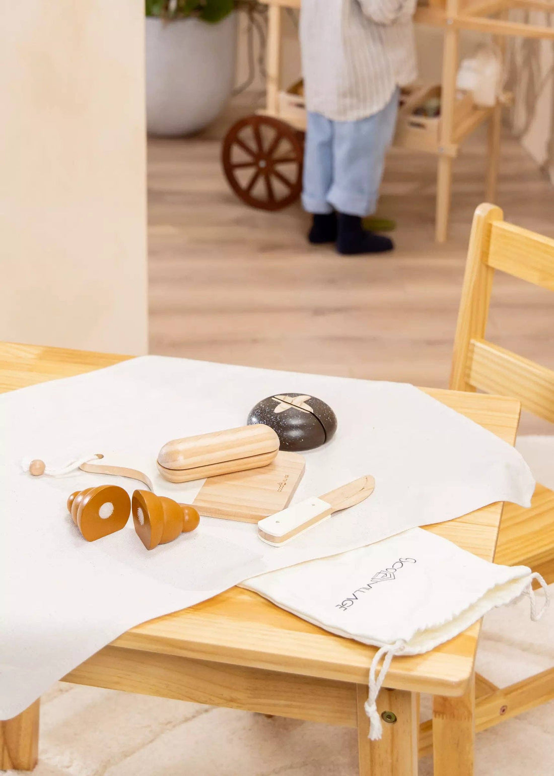 Wooden Bakery Set play food: croissants, baguette, dark bread, knife, cutting board. Full set with branded storage bag.