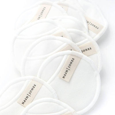 
                    
                      Nash and Jones Bamboo and Cotton Reusable Facial Pads, white, stacked close-up showing soft fabric texture and brand labels.
                    
                  