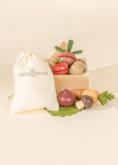 
                    
                      Wooden Vegetables Playset, wood and felt red, orange, brown veggies, white Coco Village storage bag, angled close-up
                    
                  