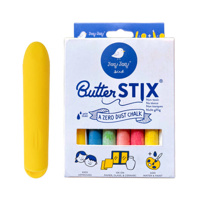 
                    
                      Jaq Jaq Bird Butterstix Dustless Chalk, white box with colorful sticks, plus one yellow chalk piece displayed beside package.
                    
                  