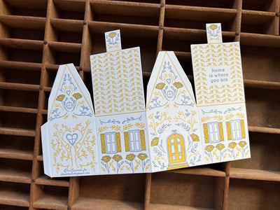 
                    
                      Home Is Where You Are 3D die-cut greeting card template, white cotton paper with yellow and blue letterpress illustrations,…
                    
                  