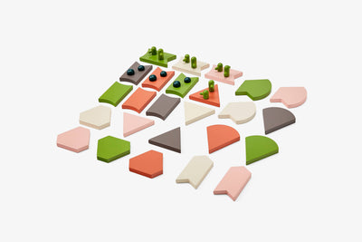 
                    
                      Blockitecture Desert Garden building blocks, overhead arrangement of green, orange, pink, brown, and cream painted wood…
                    
                  