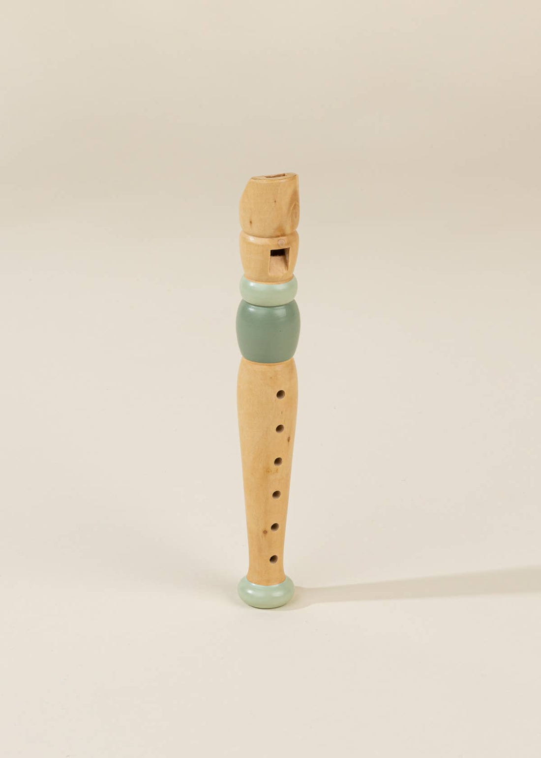 Wooden Musical Instruments Playset recorder, natural wood with light green details, front view showing finger holes.