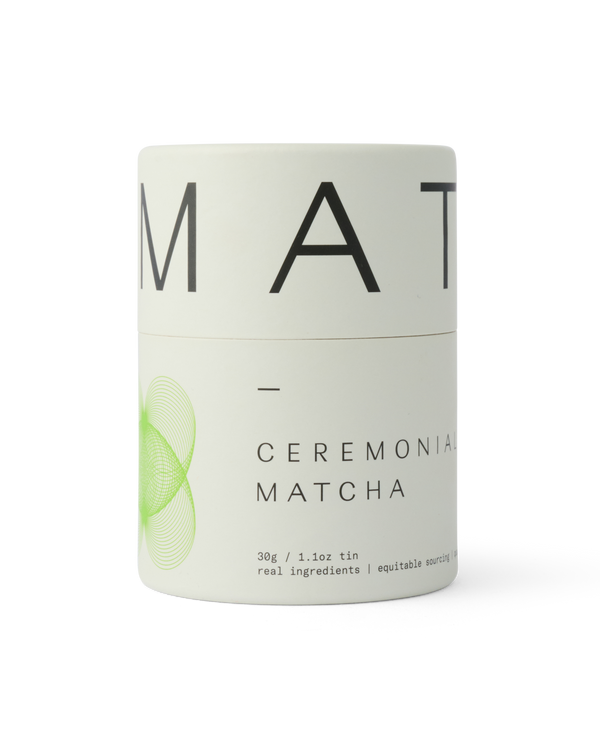 Dona Ceremonial Matcha tin, white with green spiral graphic and black text, front view on white background