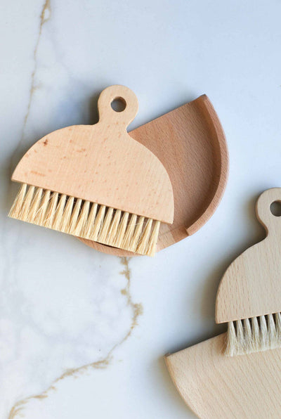 
                    
                      Table Brush set with dustpan, natural wood and sisal bristles, close-up overhead showing two sets, one complete.
                    
                  