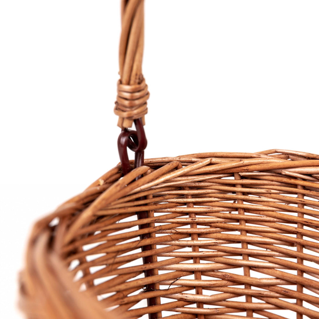 Wicker Bicycle Basket, natural rattan weave, close-up of woven texture and handle connection detail.