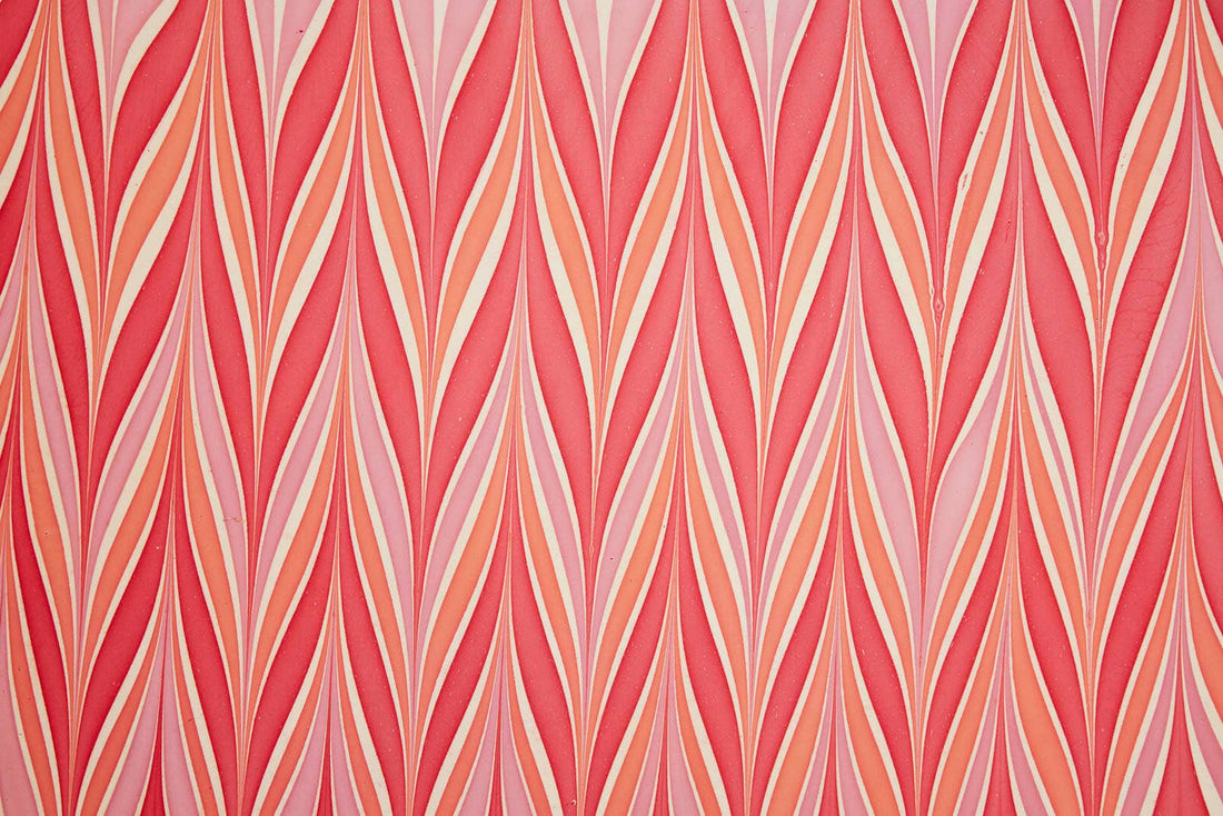 Candy Stripes Sugar Spice hand marbled wrapping paper, full pattern close-up showing red, pink, orange, white vertical…