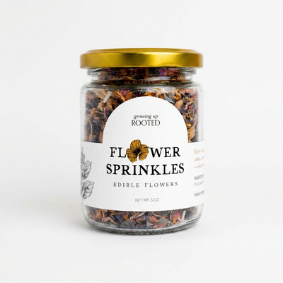 
                    
                      Growing Up Rooted Flower Sprinkles edible decor, glass jar with golden lid filled with colorful dried organic flower petals,…
                    
                  
